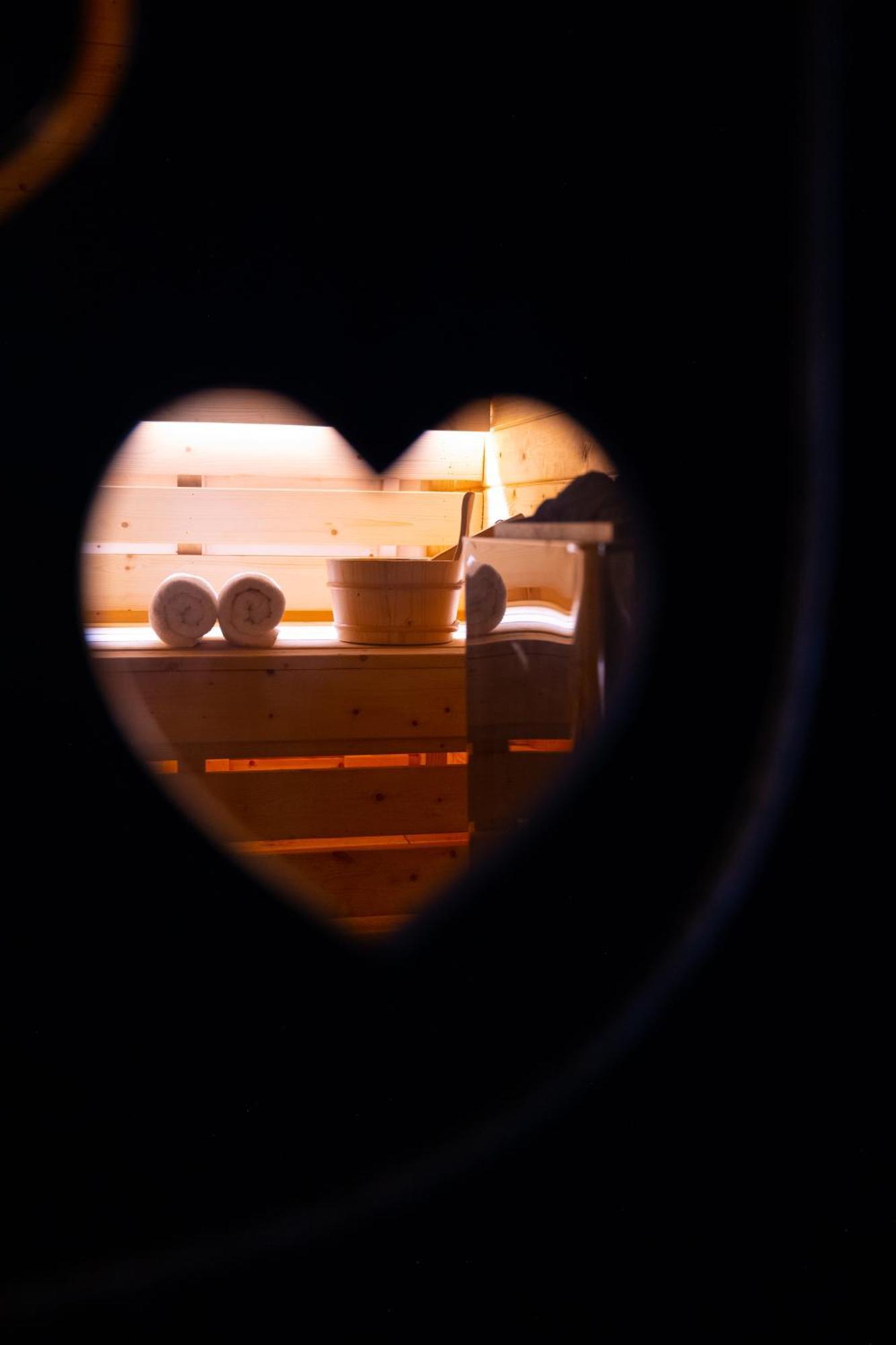 Arka Art Hotel Tirana Extérieur photo A heart-shaped hole in a sauna door